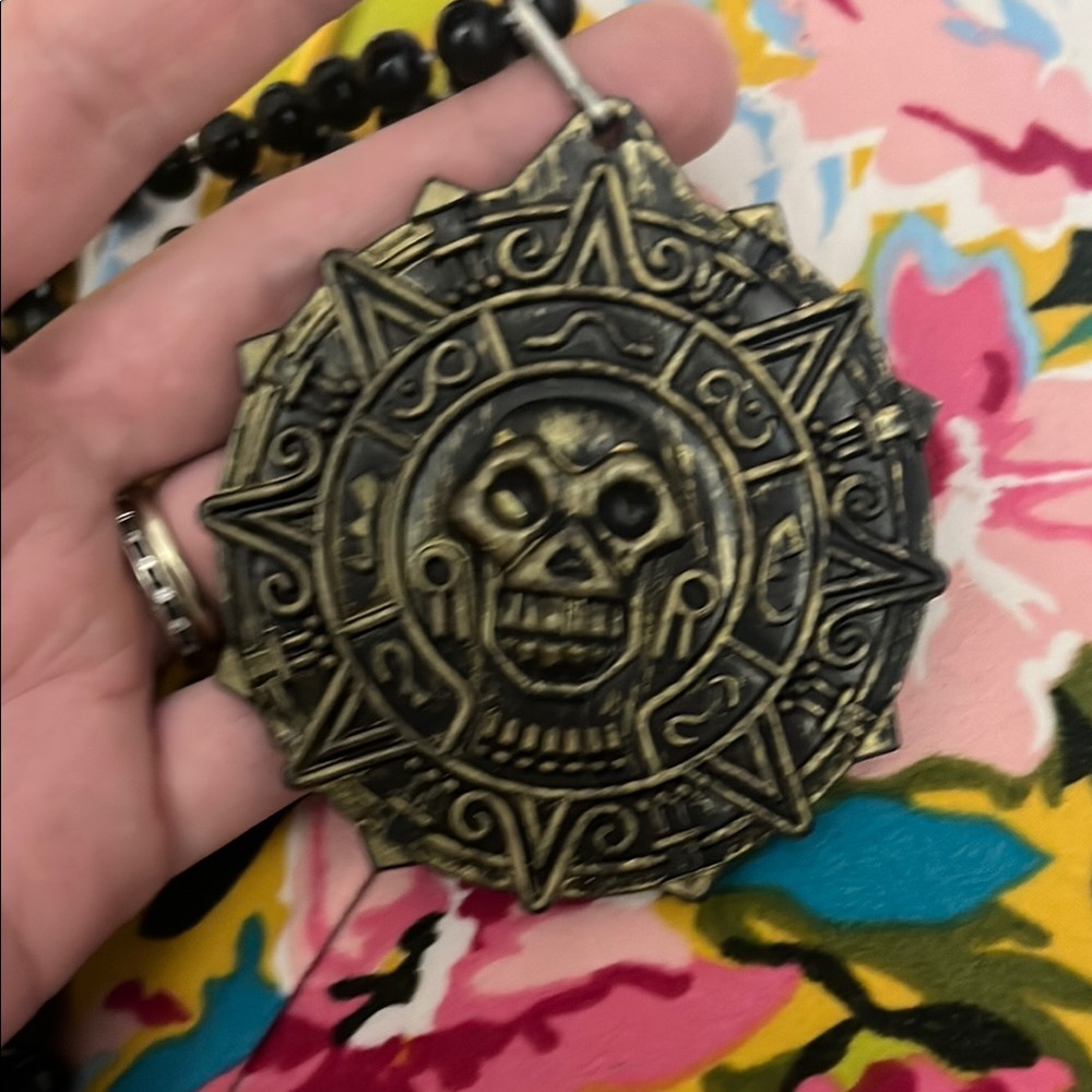 Disney Pirates of the Caribbean Aztec Gold necklace from the Treasure of Cortes